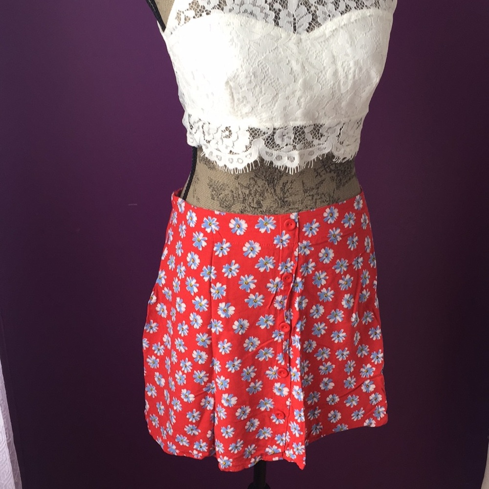 Short red skirt with blue flowers